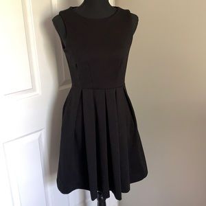 Jennifer Lopez Sleeveless black dress. Size 2